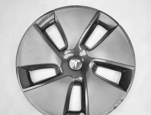 Tesla Model 3 R13 wheel hub/cap/trim 104427100A