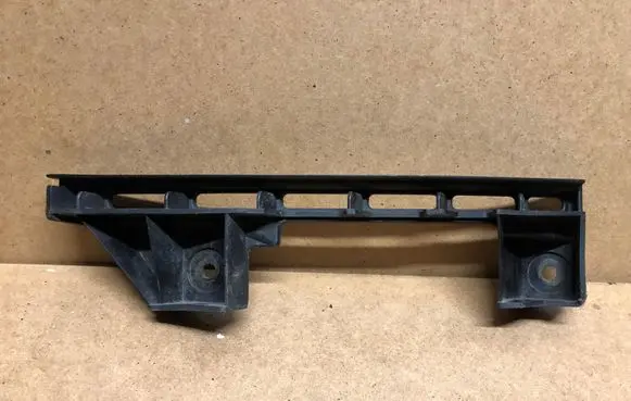 Volkswagen Touran I Front bumper mounting bracket 1T0807889B
