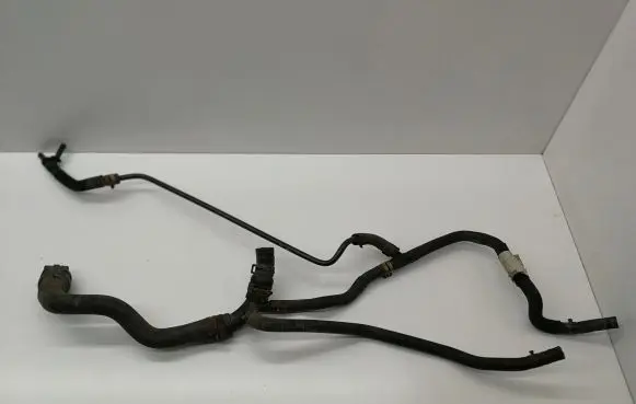 Volkswagen Golf VII Engine coolant pipe/hose 5Q0122101AS