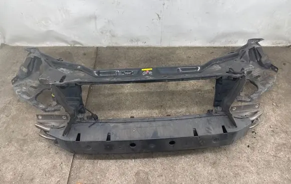 Radiator support slam panel