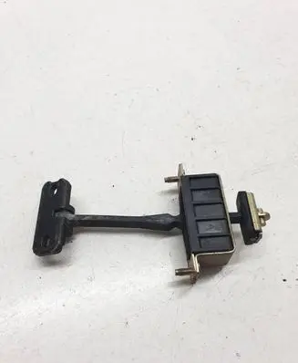 Front door check strap stopper