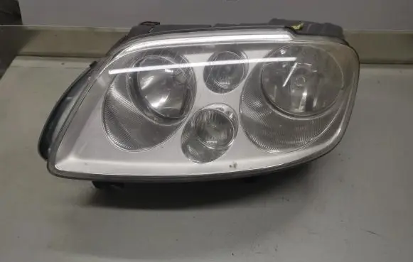 Volkswagen Touran I Headlight/headlamp 1T0941005E