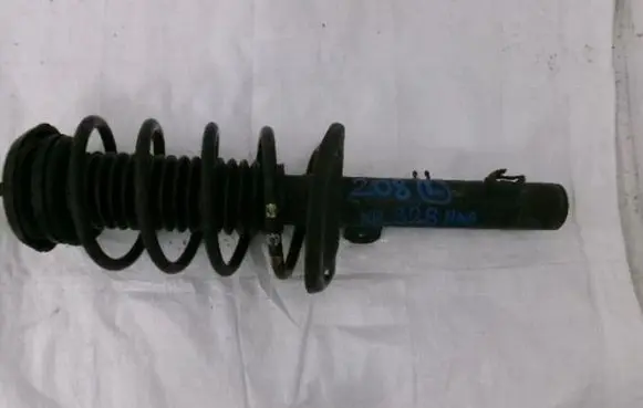 Peugeot 208 I Front shock absorber/damper 