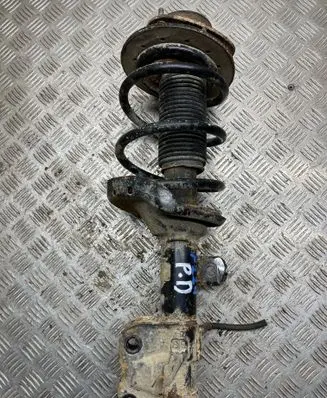 Subaru Legacy Front shock absorber with coil spring
