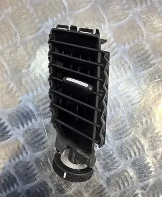 Subaru Legacy Dash center air vent grill 66110AJ030