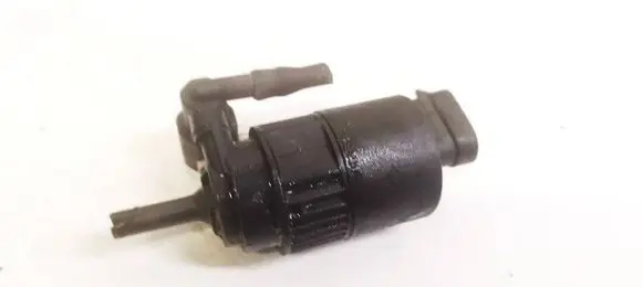 Renault Laguna I Windscreen/windshield washer pump 7700821782