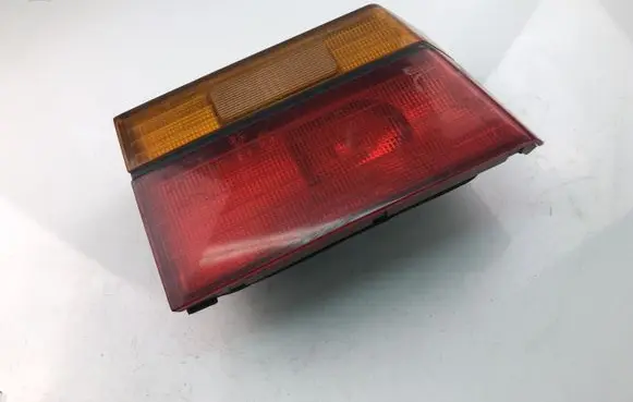 Mazda 323 F Rear/tail lights 0438496L