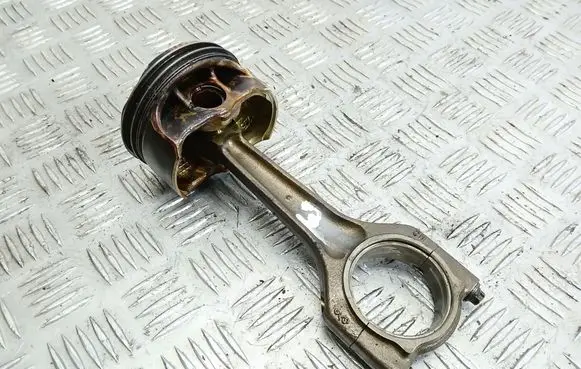 Piston with connecting rod