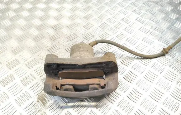 Nissan Juke I F15 Front brake caliper