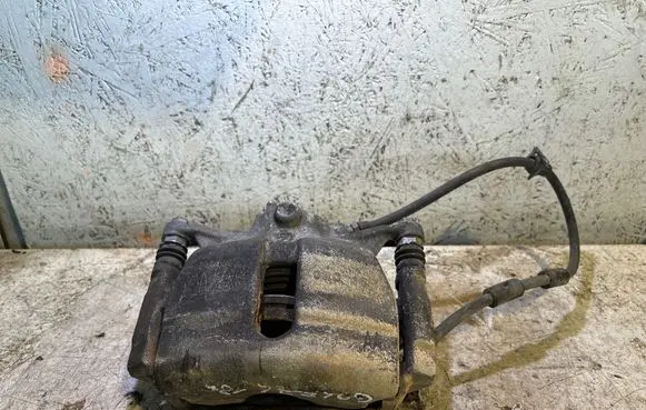 Volkswagen Golf VII Front brake caliper