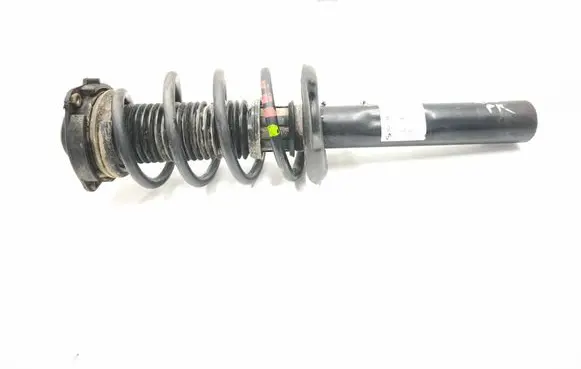 Volkswagen Caddy Front shock absorber with coil spring 317575 824904013020