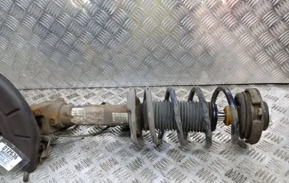 Volkswagen Touran II Front shock absorber with coil spring