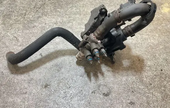 Thermostat/thermostat housing