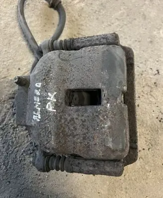 Nissan Almera N16 Front brake caliper