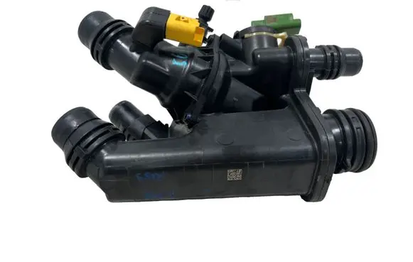 Thermostat/thermostat housing