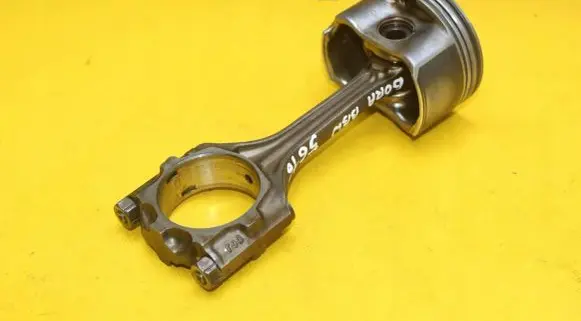 Volkswagen Golf IV Piston with connecting rod 06J