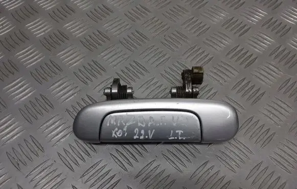 Mazda 323 F Rear door handle trim 