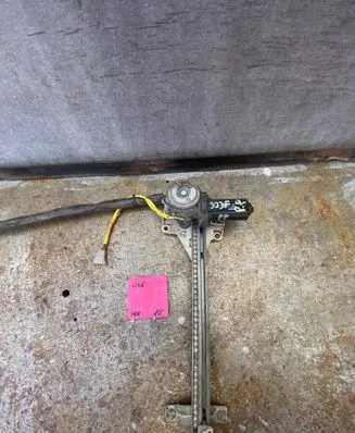 Mazda 323 F Front door window regulator with motor 