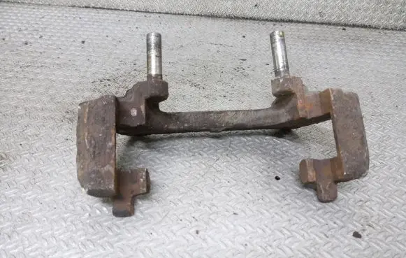 Volvo S60 Front Brake Caliper Pad/Carrier 