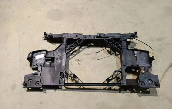 Radiator support slam panel