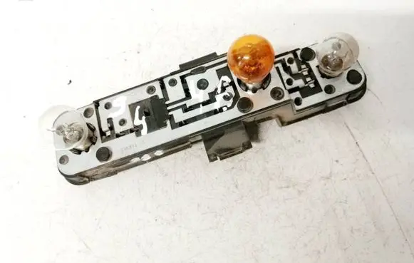Nissan Almera N16 Tail light bulb cover holder 236873