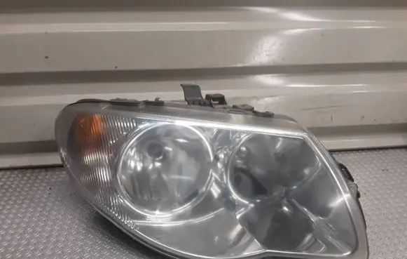 Chrysler Voyager Headlight/headlamp 04857830AC
