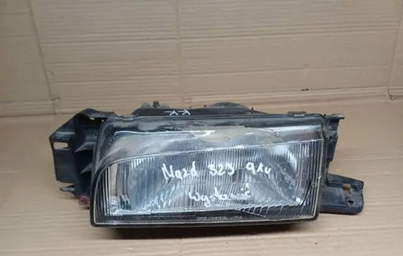 Mazda 323 Headlight/headlamp 11061308 H412V6055W