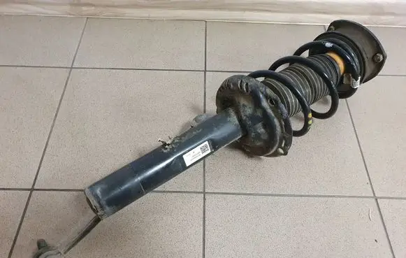 Audi Q2 - Front shock absorber with coil spring 5Q0413031HJ