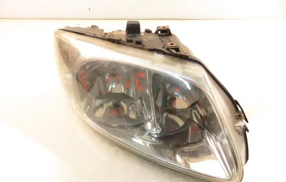 Chrysler Voyager Headlight/headlamp 04857702AB
