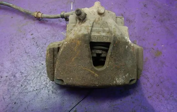 Opel Zafira B Front brake caliper