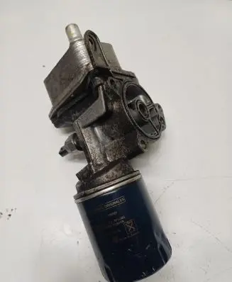Oil filter mounting bracket
