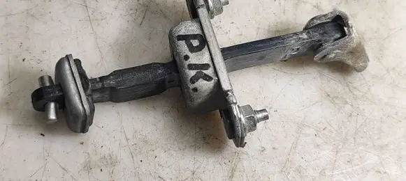 Subaru Impreza III Front door check strap stopper 