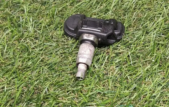 Opel Astra J Tire pressure sensor 13581560 1446230180F74