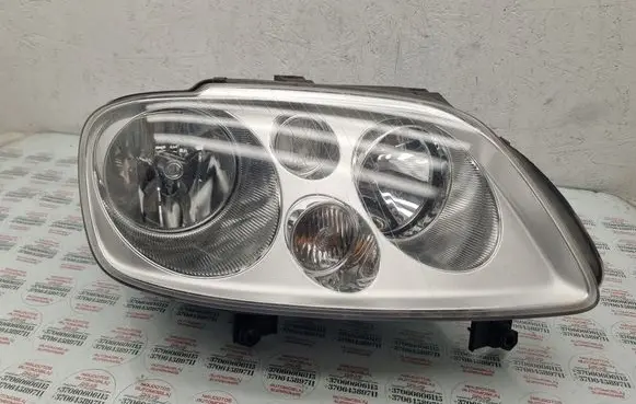 Volkswagen Touran I Headlight/headlamp 1T0941006F