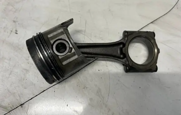 Opel Combo B Piston with connecting rod