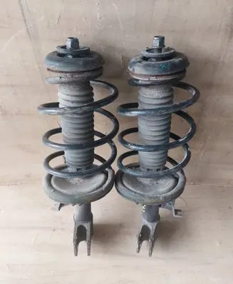 Citroen C4 I Front shock absorber with coil spring 
