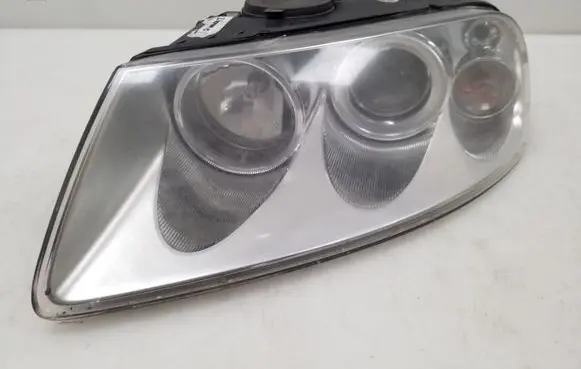 Volkswagen Touareg I Headlight/headlamp 