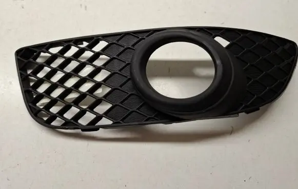 Mitsubishi Lancer VIII Front fog light trim/grill 8321A089