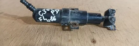 Headlight washer spray nozzle