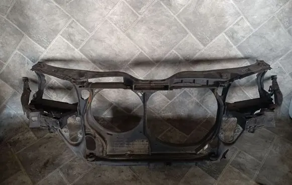 Radiator support slam panel