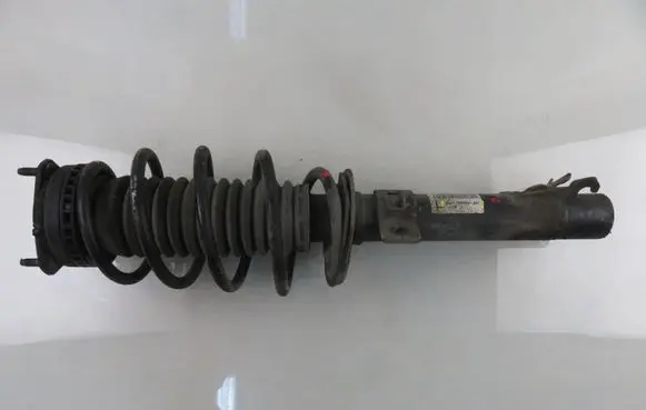 Front shock absorber with coil spring