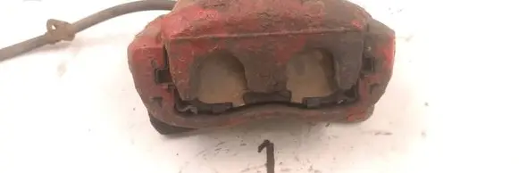 Subaru Impreza III Front brake caliper