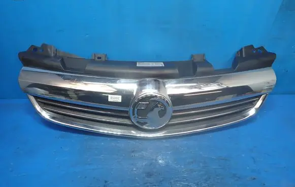 Opel Zafira B Front bumper upper radiator grill 13247331