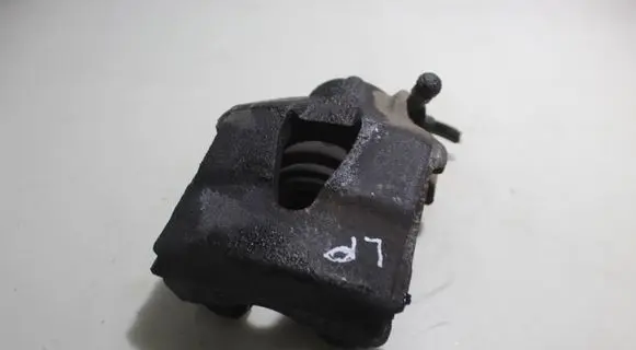 Volkswagen Golf VI Front brake caliper