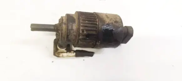 Renault Laguna I Windscreen/windshield washer pump 7700821782
