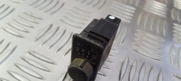 Nissan Primera Headlight level height control switch