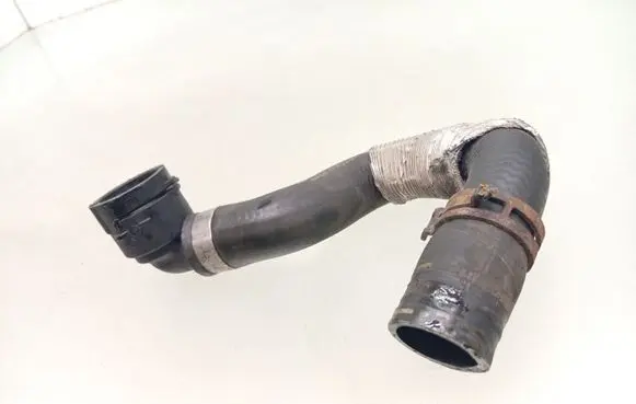 Volkswagen Golf VII Engine coolant pipe/hose 5Q0122073AL