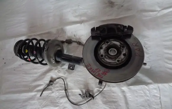 Front wheel hub spindle knuckle