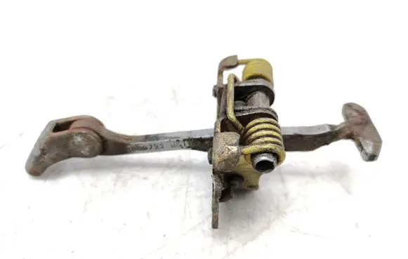 Front door check strap stopper