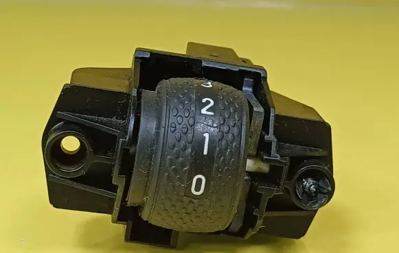 Headlight level height control switch